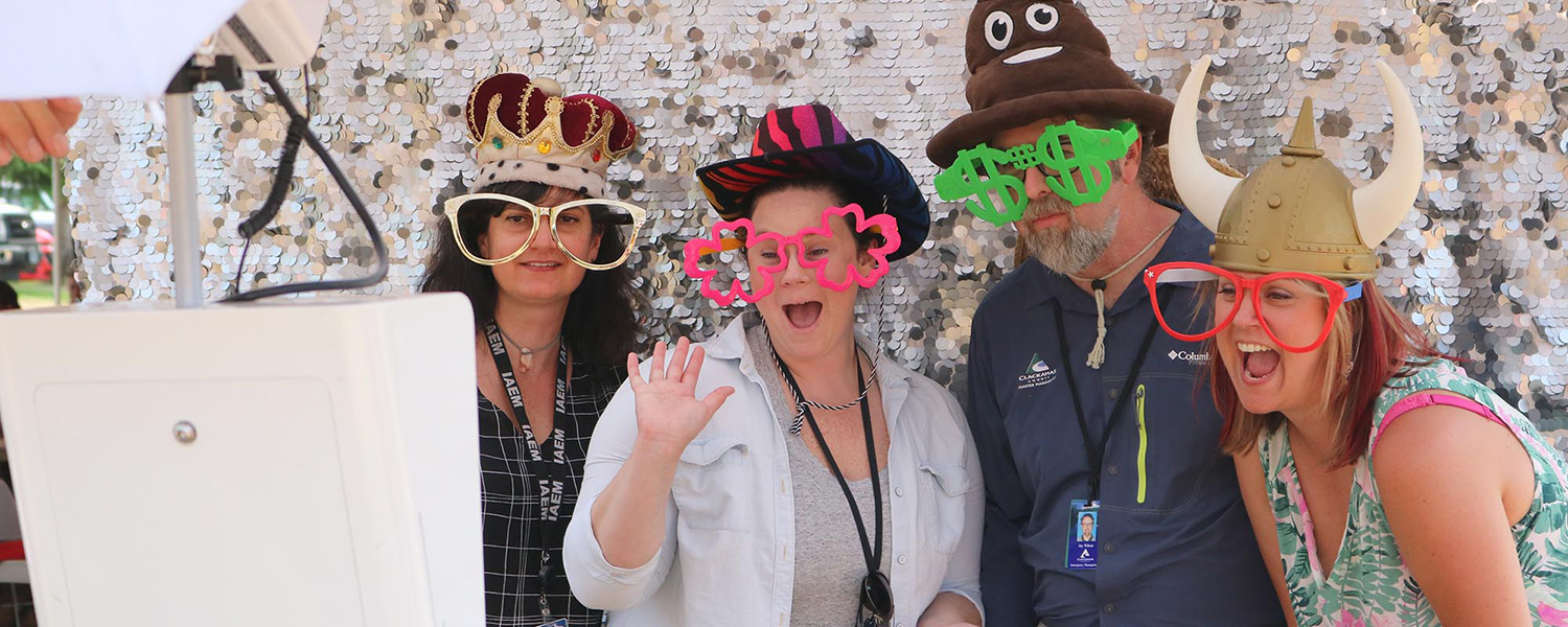 employees at a photobooth