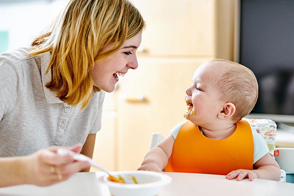 Mother feeding Baby