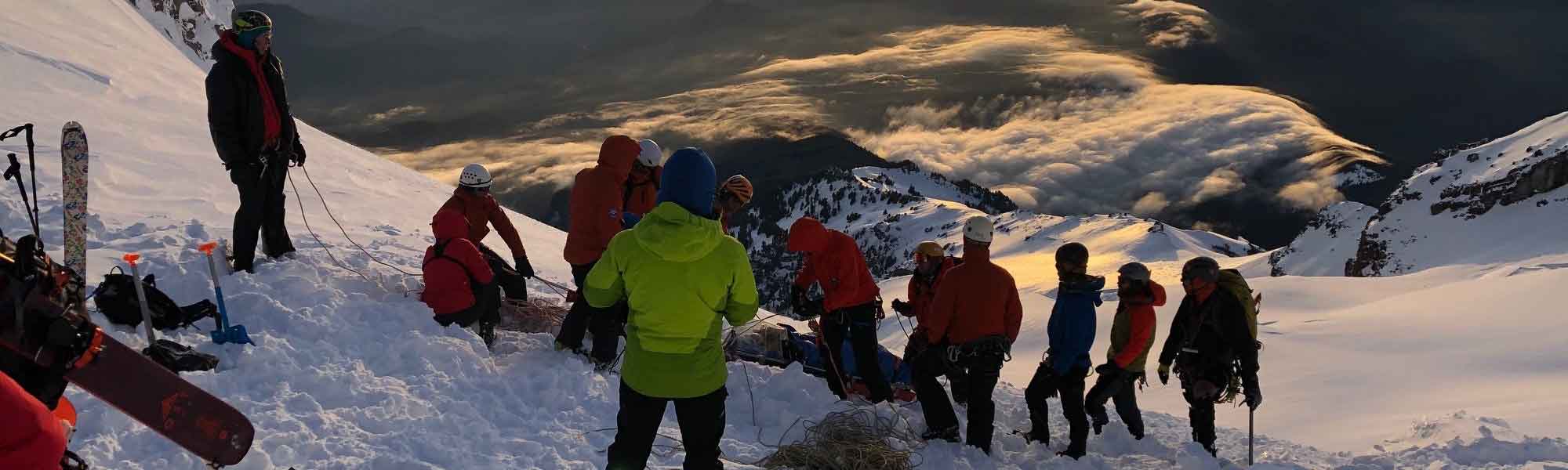 Volunteers on Mt. Hood at sunset