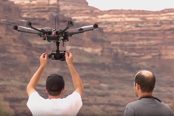 Man launching drone