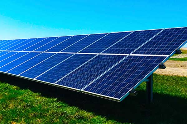 Solar panels in a sunny field