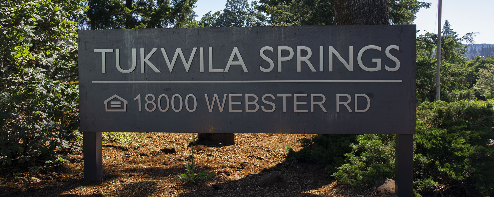 Sign in front of the Tukwila Springs building