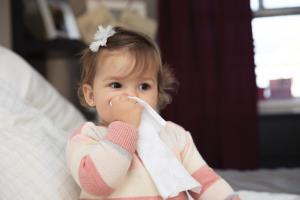 baby girl with tissue