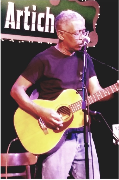 Steve playing a guitar