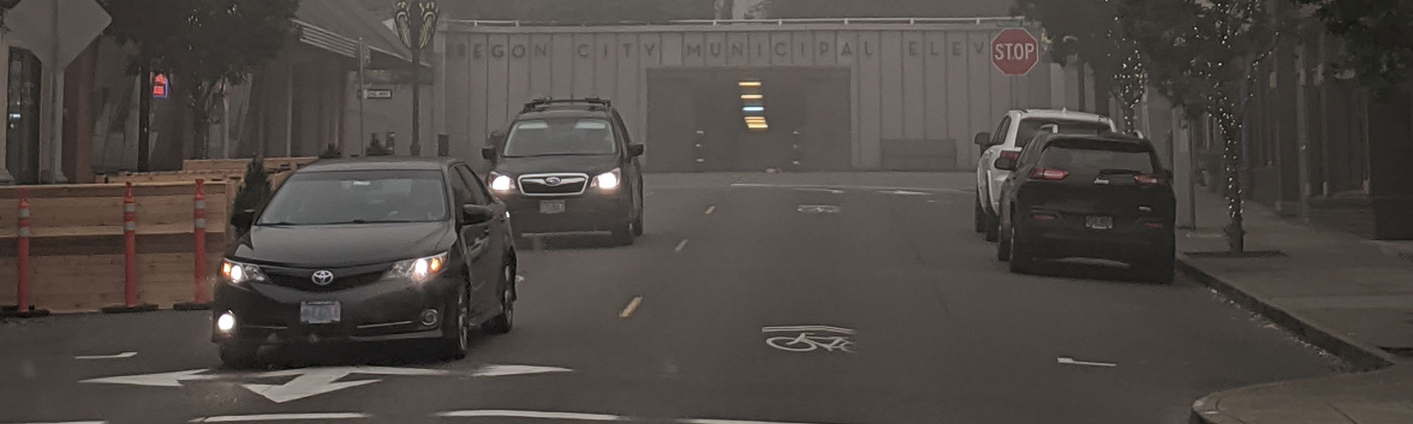 Cars on the road in smoky weather