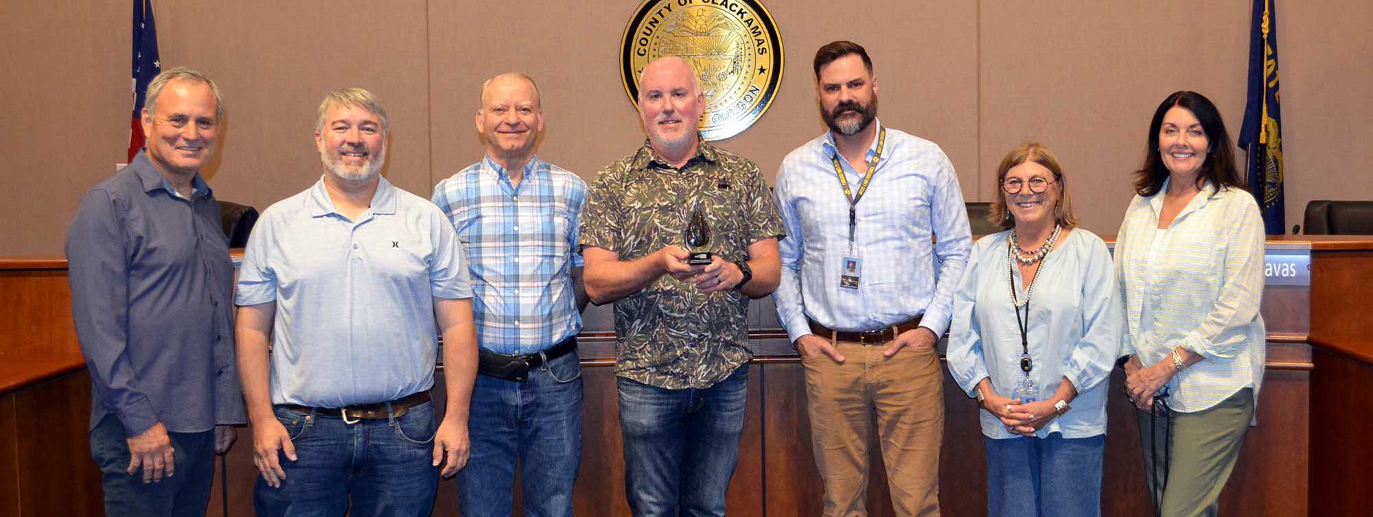WES staff and the Board of County Commissioners with the award