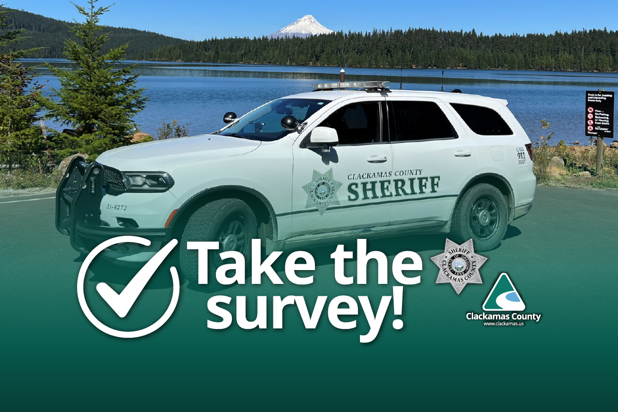 Sheriff's vehicle at Timothy Lake, with Mt. Hood in the background and with the text "Take the survey!" and Clackamas County and Clackamas County Sheriff logos