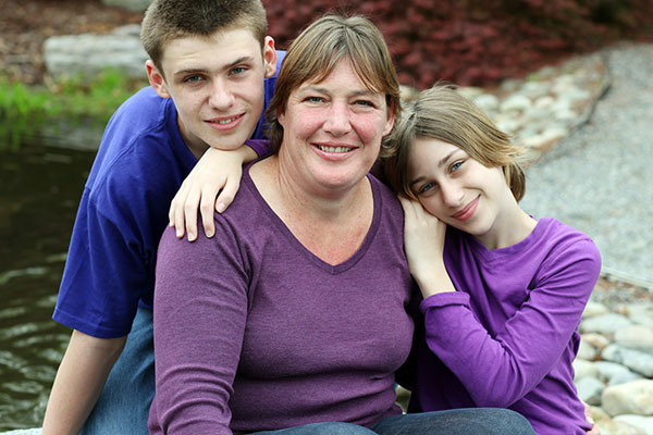 Mother and children outdoors