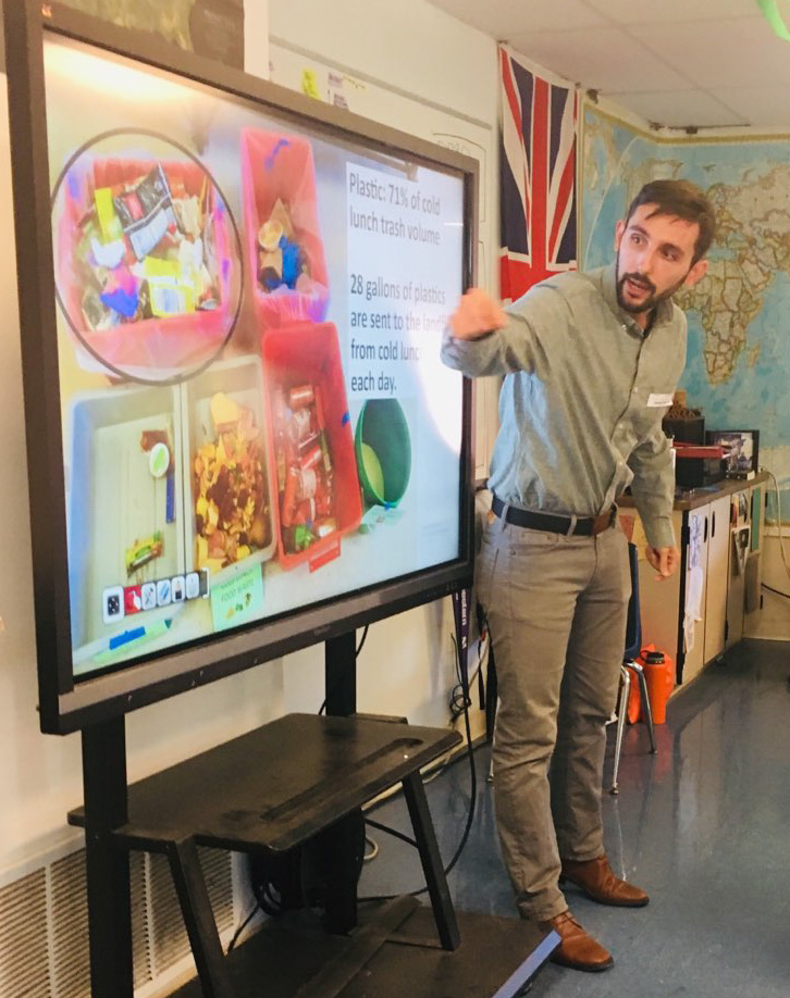Man giving presentation at a school