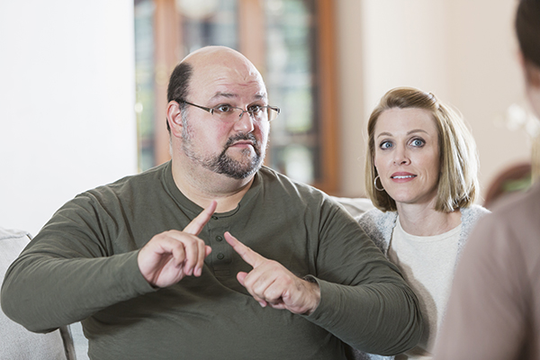 Man using sign language