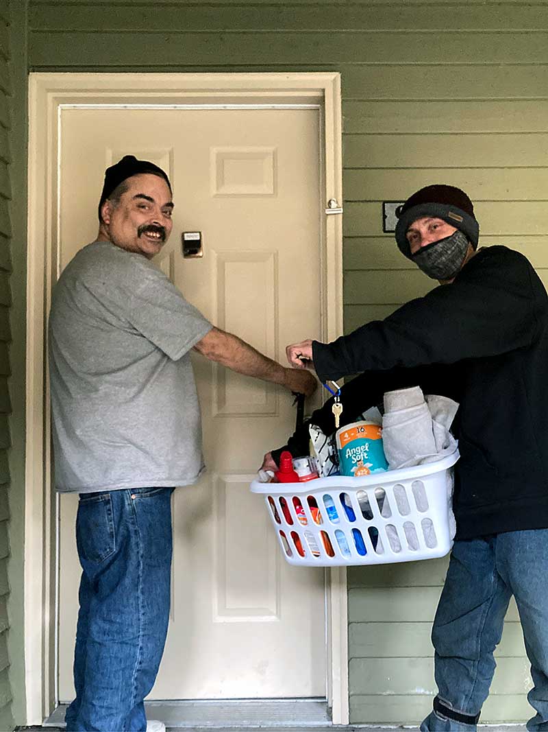 David and Tony at their new apartment