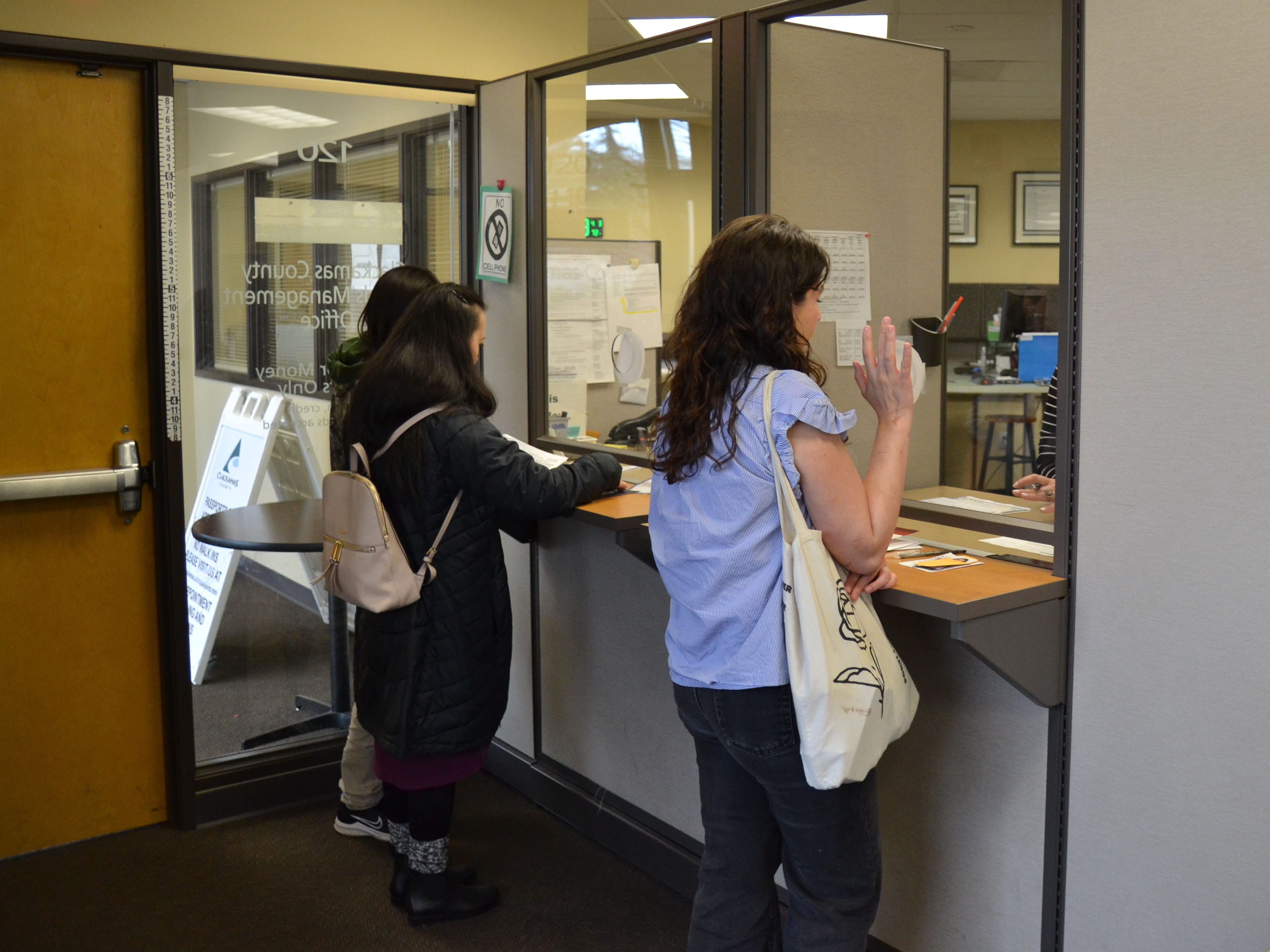 Clackamas County citizens apply for passports at the Records Management Division