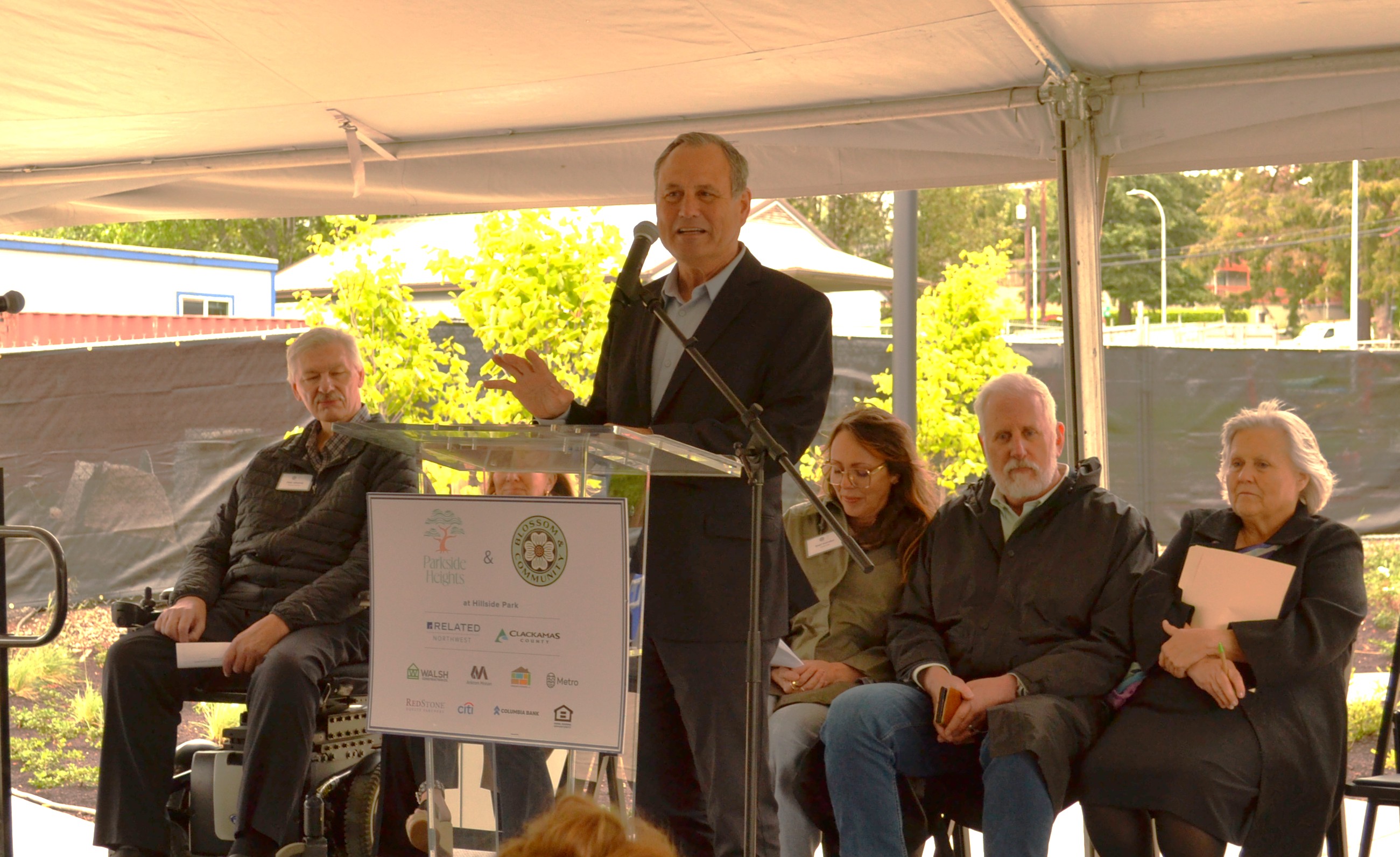 Chair Craig Roberts spaeaking at a podium