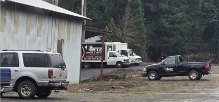 Vehicles in front of property
