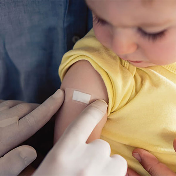 Toddler getting vaccinated