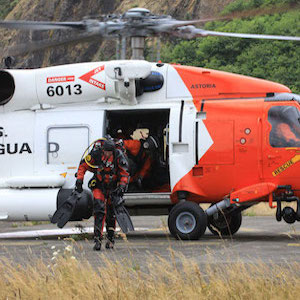 Water Rescue Team exits Coast Guard chopper during training