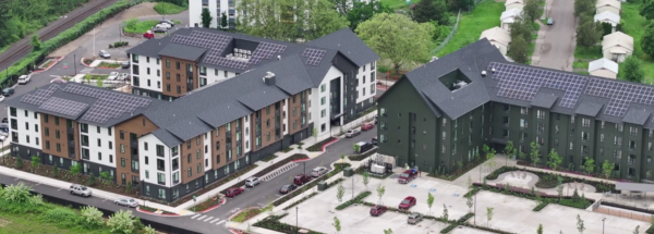 Hillside arial of buildings and parking areas