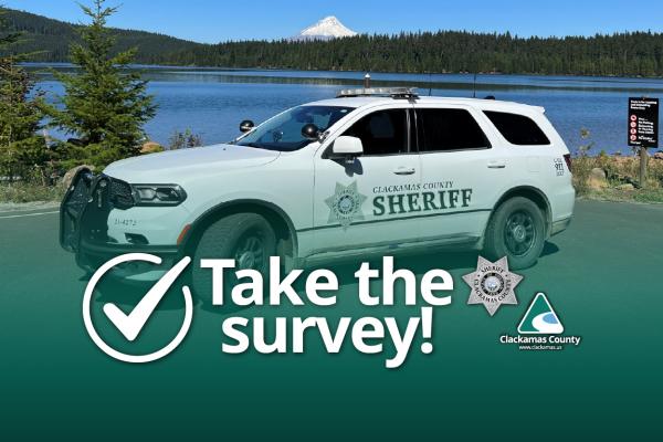 Sheriff's vehicle at Timothy Lake, with Mt. Hood in the background and with the text "Take the survey!" and Clackamas County and Clackamas County Sheriff logos