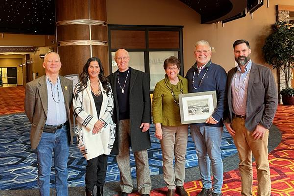 Board members and two members of the Confederated Tribes of Grand Ronde