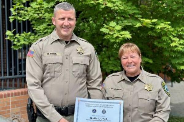 Capt. Brad O-Neil with Sheriff Angela Brandenburg