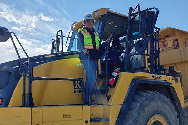 Chelsea Asselmeier, excavator operator, working on the construction of our new county courthouse