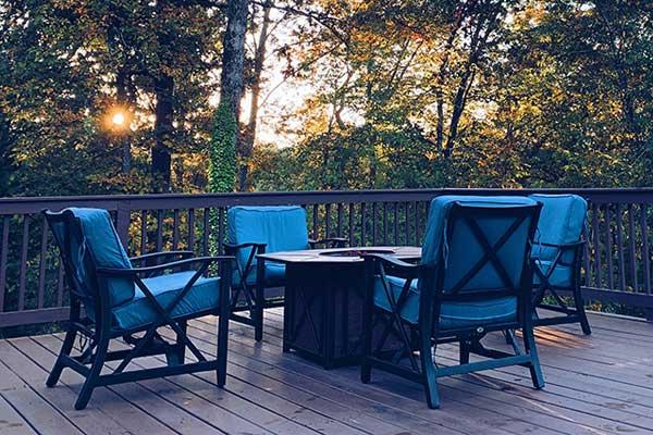 Chairs on a deck at sunset