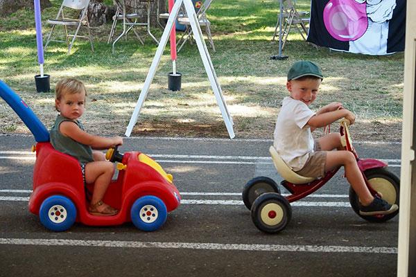 Two brothers ride Safety Street.