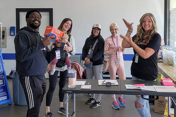 Outreach workers staff a laundry and homeless resource event in the rural town of Molalla on Sept. 19, 2023, thanks to funding from the Governor’s emergency order on homelessness.