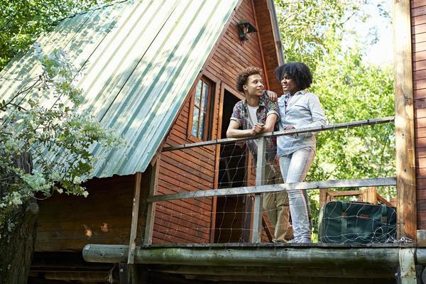 Couple at a short-term rental location, enjoying their vacation