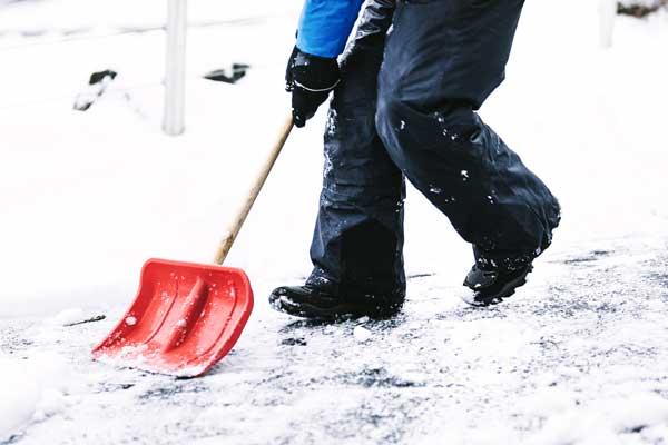 Person shoveling snow