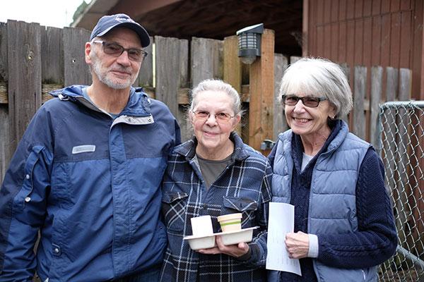 3 people smiling