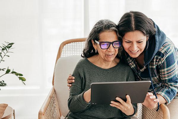 mother and daughter taking survey