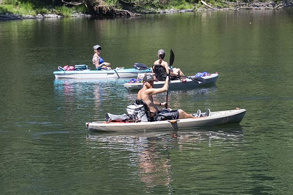 People kayaking