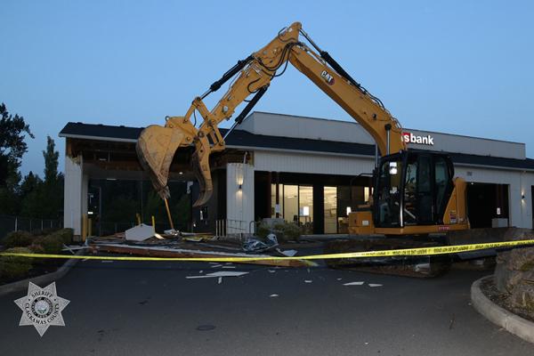 Excavator outside of US Bank