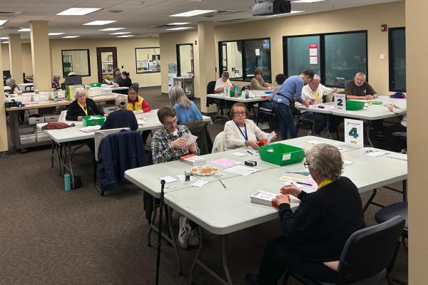 Election workers process ballots on election night.