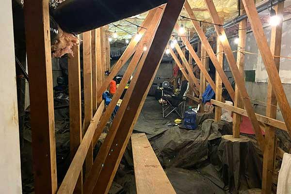 Lights and a living area in a crawlspace