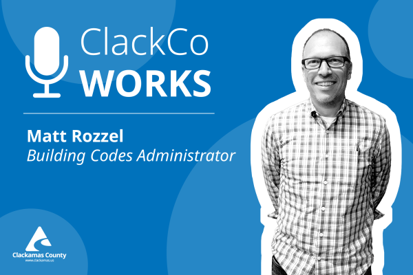 ClackCo works logo and photo or smiling man