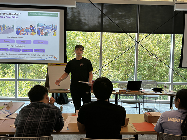 Teen giving a presentation to his peers